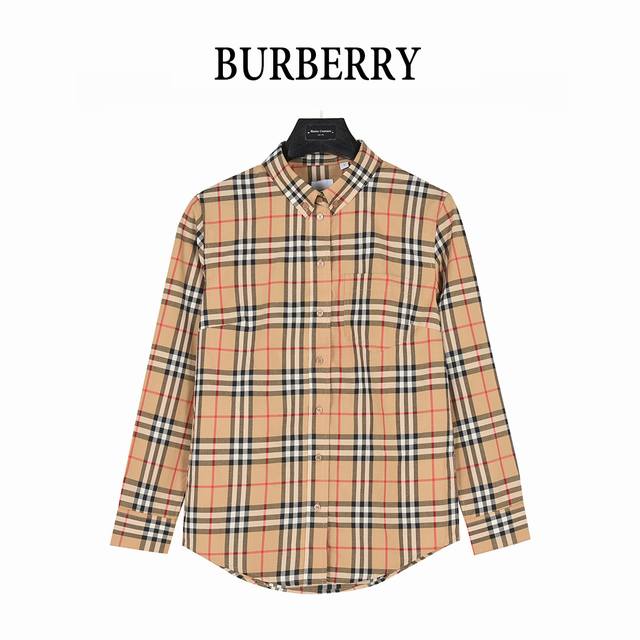 Burberry plaid long-sleeved shirt with cuffs and plaid. Made from double-strande