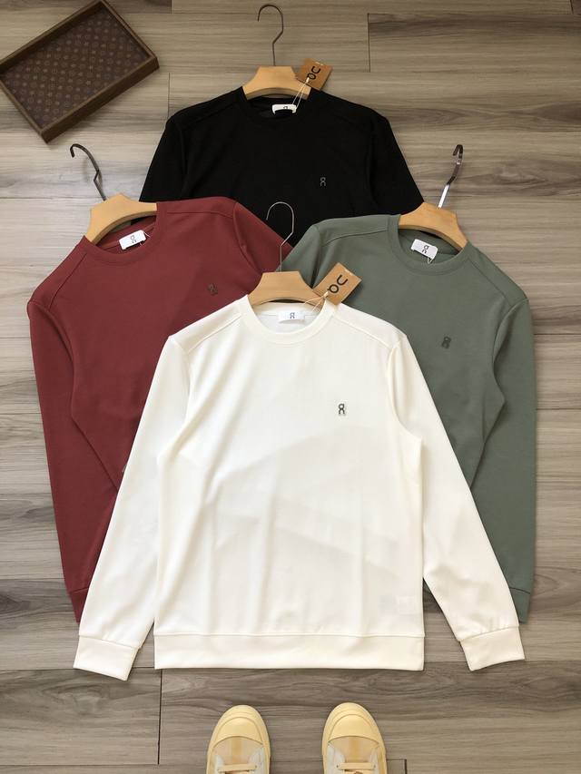 On logo-embossed men's business, sportswear, and casual crewneck sweatshirt. Col