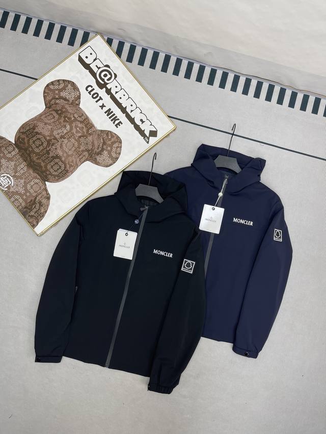 A top-tier replica, a Moncler men's jacket and windbreaker, available at the Mon