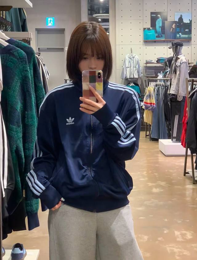 Model Picture# Adidas Trefoil Logo embroidery, classic three-bar webbing decorat