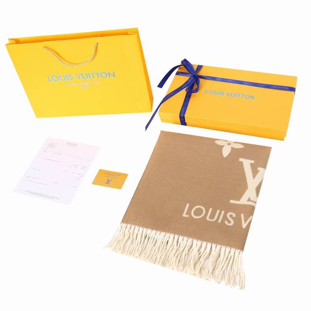 Louisvuitton's signature warm and fashionable cashmere scarf in a milk tea color