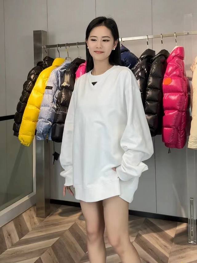 Newly released in sizes M to 3Xl . This classic Prada crewneck sweatshirt with