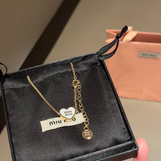 Miumiu's limited edition heart-shaped necklace. Miumiu understands women best. T