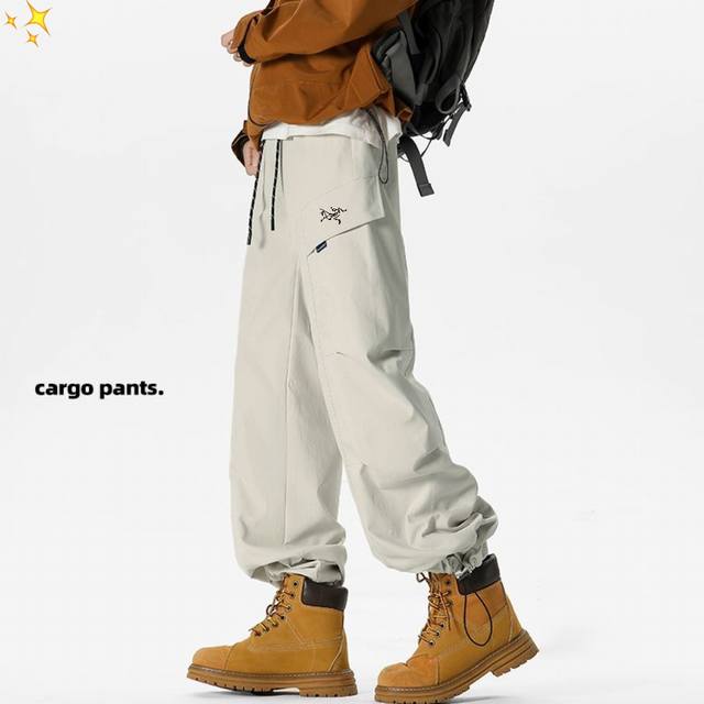 Arc'Teryx Outdoor Triple-Proof Pants. Wide-leg, large-pocket, casual, functional