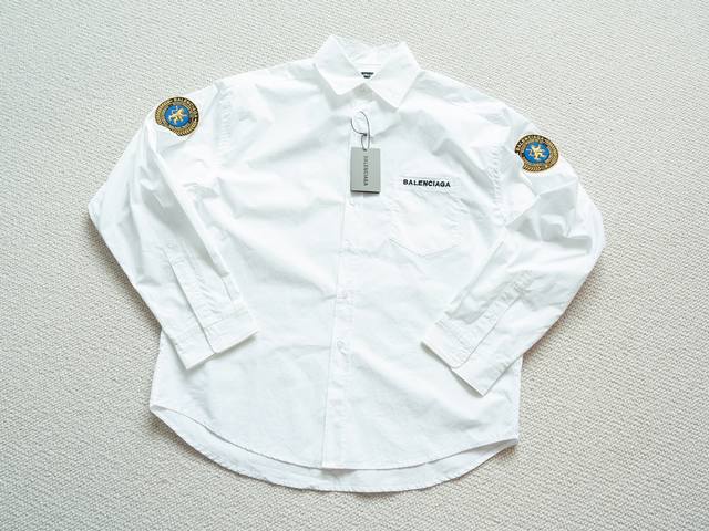 Balenciaga Fw25 loose long-sleeved poplin shirt with a solid-color embroidered