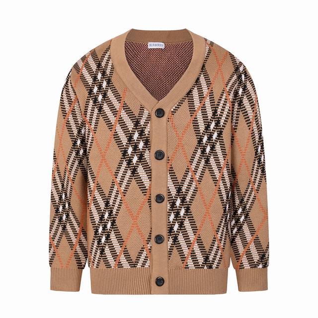 Burberry's color-blocked twill plaid knit is precisely matched and is a plain st