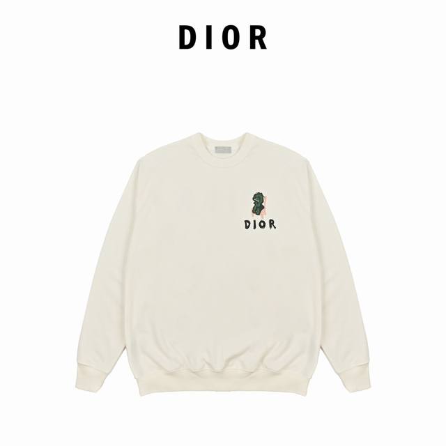 Dior's new round-neck sweatshirt with a playful dinosaur print. The new logo pri