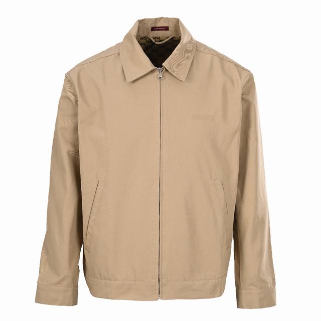 Gucci solid-color jacket with a small chest monogram logo. Original design purch