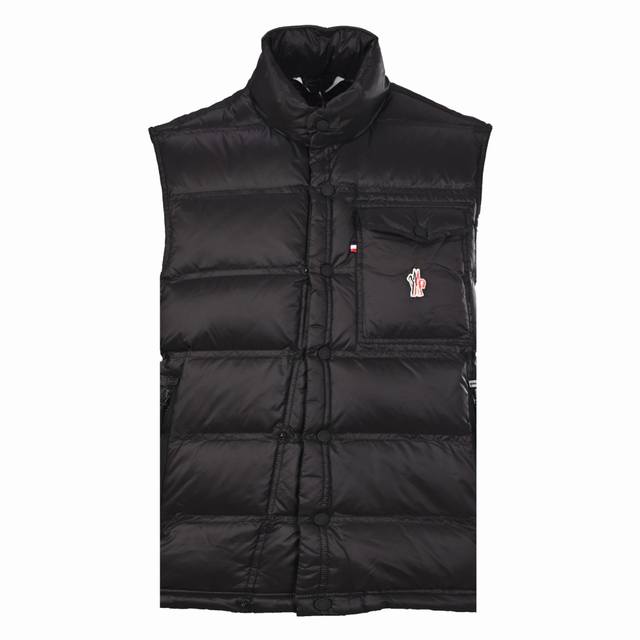 Moncler's reflective down vest is crafted from ultra-fine nylon yarns woven with