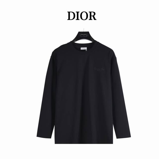 Dior's classic embroidered signature long-sleeve top is made from custom fabric.