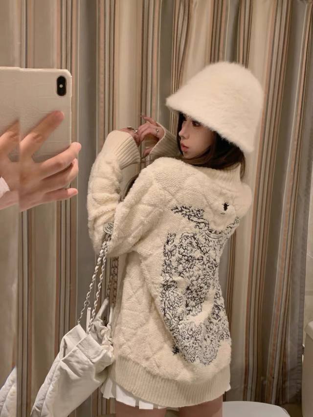 Haute couture edition, heavily crafted. Dior butterfly embroidered diamond quilt