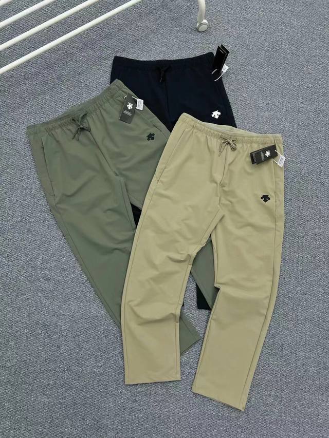 # New fall/winter Descente Dualis urban commuter sports outdoor trousers, Ib-Str