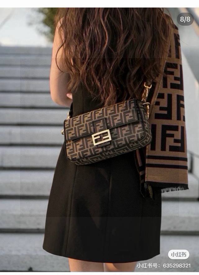 Fendi Baguette Bag features a classic monogram pattern and a caramel color for a