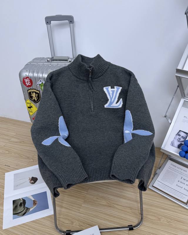 Louis Vuitton's classic jacquard-knit wool pullover, a stand-up collar ski swea