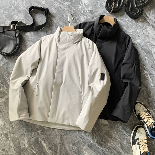 Descente-Dualis series urban commuter short down jacket with a small stand-up co