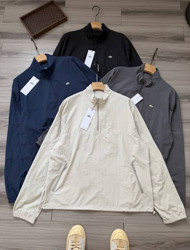 Alo Yoga four-color monogram logo embroidery. This lightweight, soft, and comfor