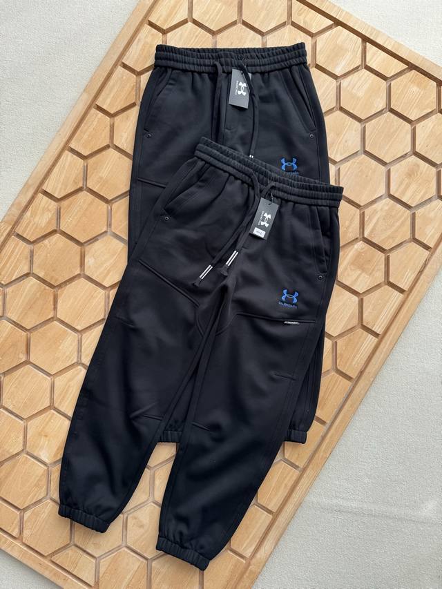 Get hooked on the Balenciaga x Under Armour Fw24 collaboration sweatpants! The