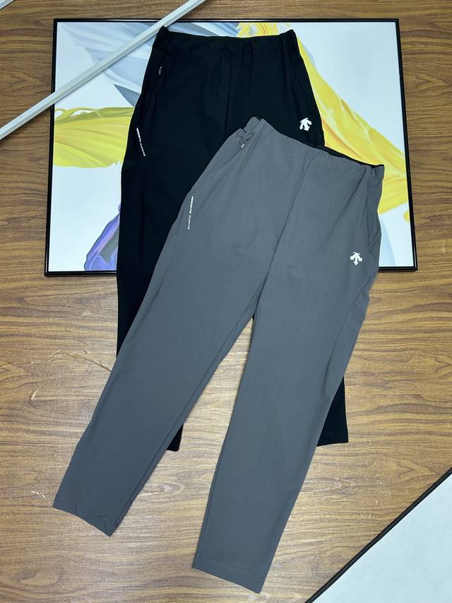 control, Descente Descente men's autumn sports trousers. Descente pants are a c