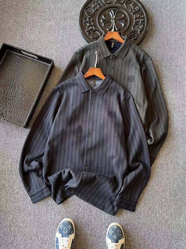 Super soft plush fleece! A hot item! New from Loewe, this striped, ultra-soft wo