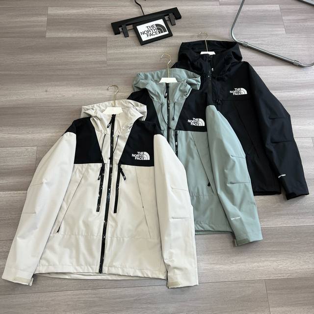 The North Face Dryvent fabric windproof and rainproof outdoor jackets for men an