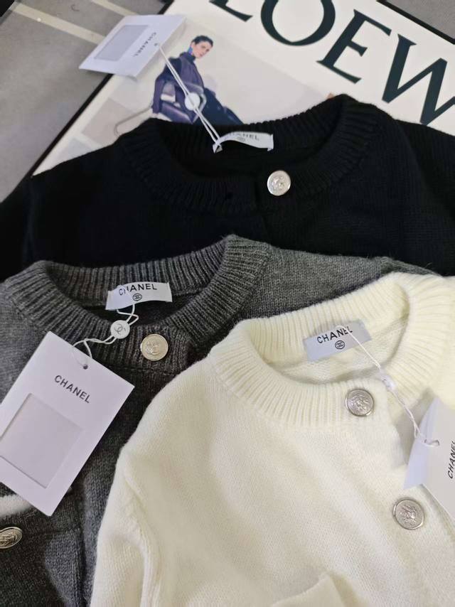 Details: Chanel waisted cardigan. A very classic and timeless silhouette. You ca