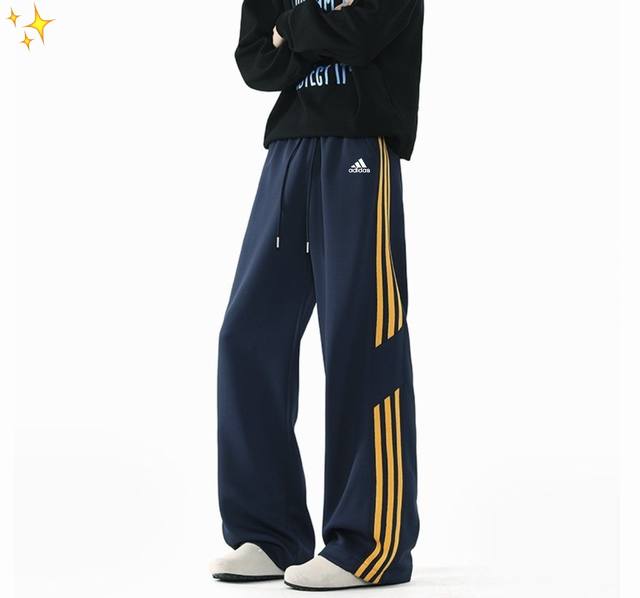 For , these high-street-inspired adidas striped casual pants feature contrasti