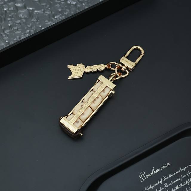 Louis Vuitton 24 Early Spring Limited Edition, featuring a detachable dice keych
