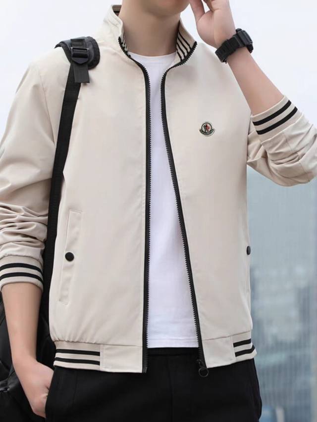 Moncler Men's and Women's Casual Stand-Up Collar JacketThis classic Tommy style