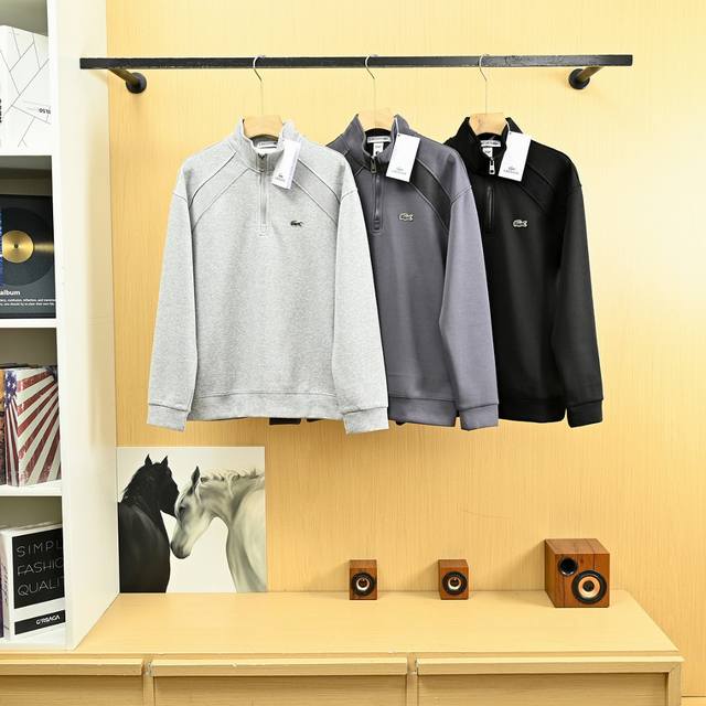 , style X2584. Lacoste 25S, a new fall/winter men's half-zip stand-up collar cas