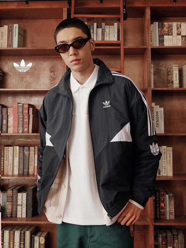 New arrivals . The classic three-bar stand-up collar jacket is on sale at the