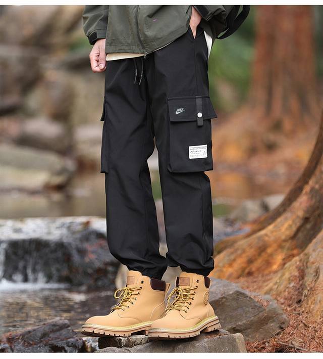 High-quality Nike 25Ss waterproof trousers in four colors for autumn, sports an