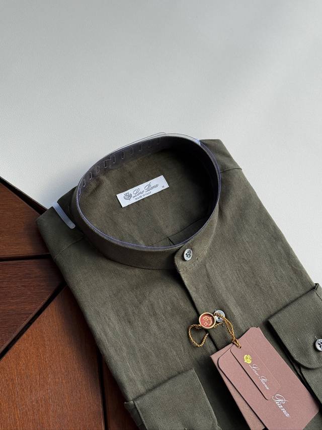 Green, close-up. An epic linen shirt, an exclusive Lp creation, featuring a ret