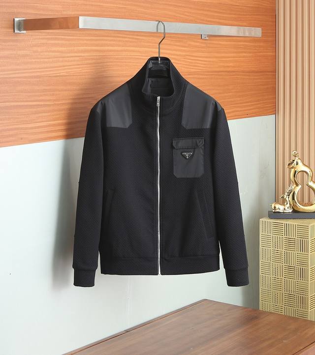 Same style as the official Prada website, this knitted patchwork jacket features