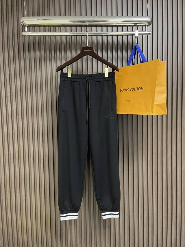 Top and Trousers Gucci contrast stripe embossed hooded casual jacket and sweatpa