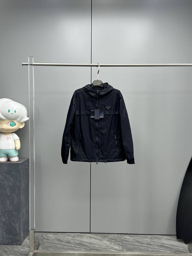 Prada's new men's jacket for early fall 2025, featuring all original, three-lab