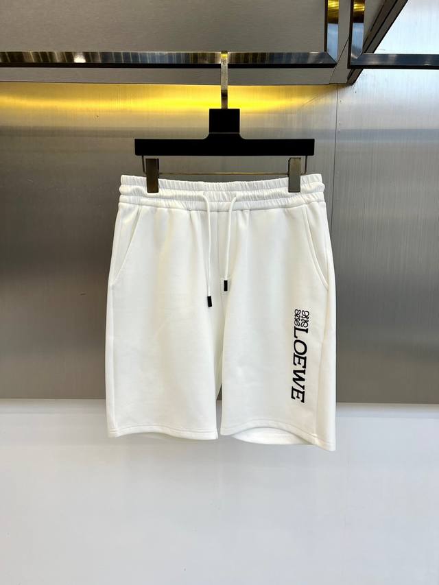 New summer casual shorts from Lowe and 25S! Drawstring and embroidered logo des
