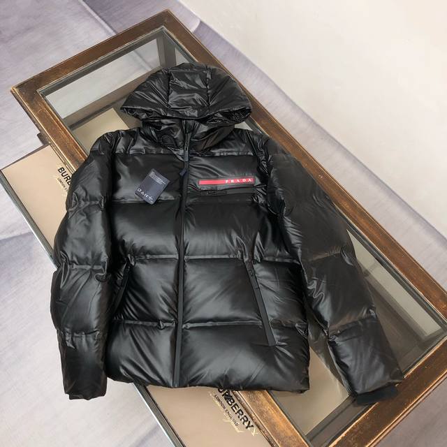 prad Prada short heavy-duty laminated hooded down jacket, unisex, with a red lab