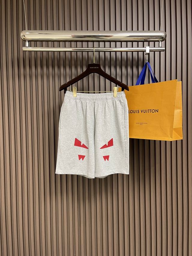 Fendi Little Monster logo Bermuda shorts. Made from custom-made fabric, these 38