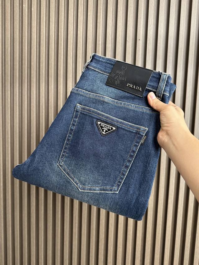 Prada's latest autumn and winter casual jeans, 25FW, in blue, feature a classic