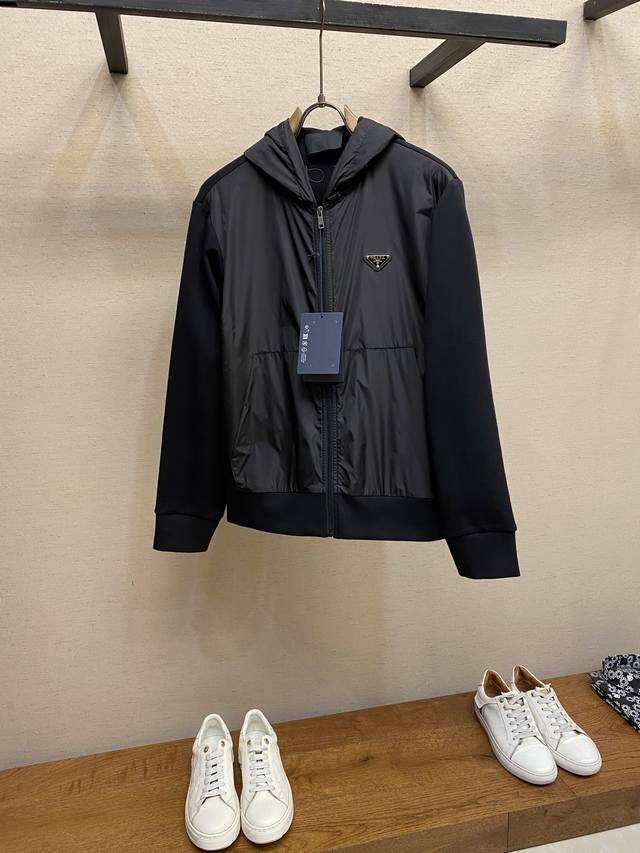 prada, Technical Cotton and Re-Nylon Hoodie. Re-Nylon adds a sporty and sophisti