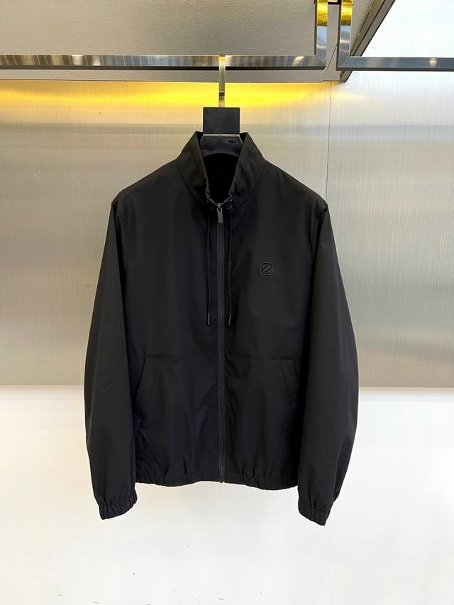 Ermenegildo Zegna's stand-up collar jacket is perfect for both business and casu