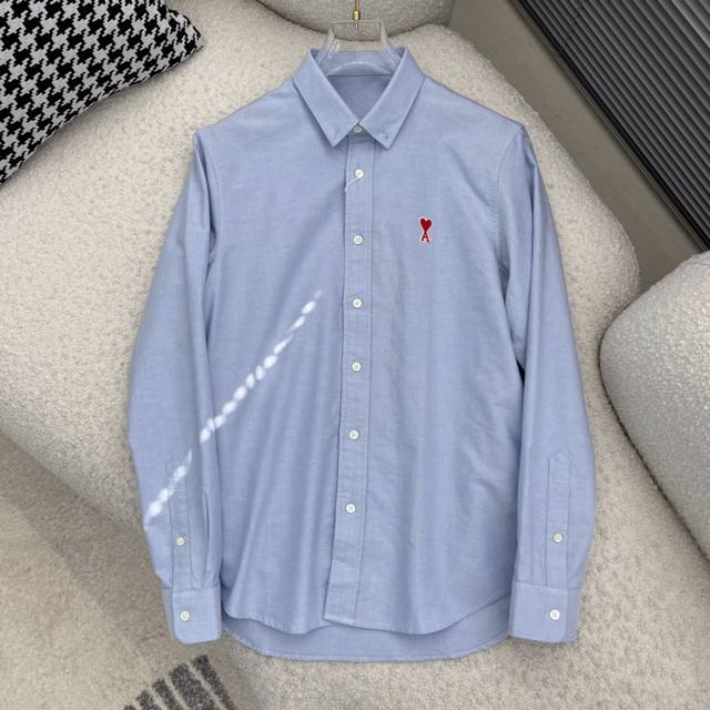 new# Ami embroidered contrasting logo Oxford shirt. A versatile style with visib