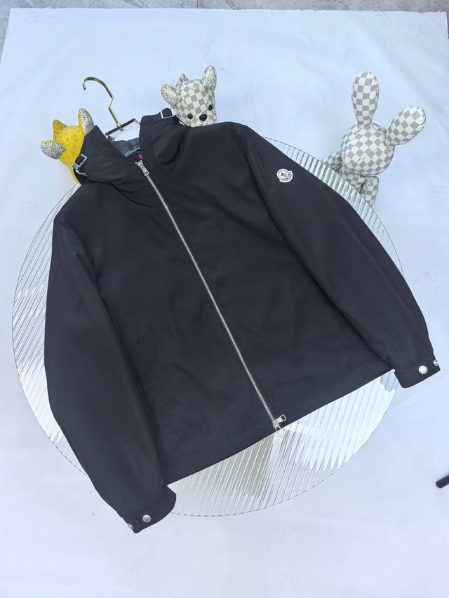 The Moncler 25 Early Fall jacket, featuring lightweight protection, defines a ne