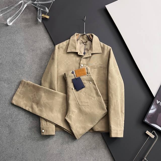 A jacket and pants set featuring the new Safari Monogram pattern for fall/winte