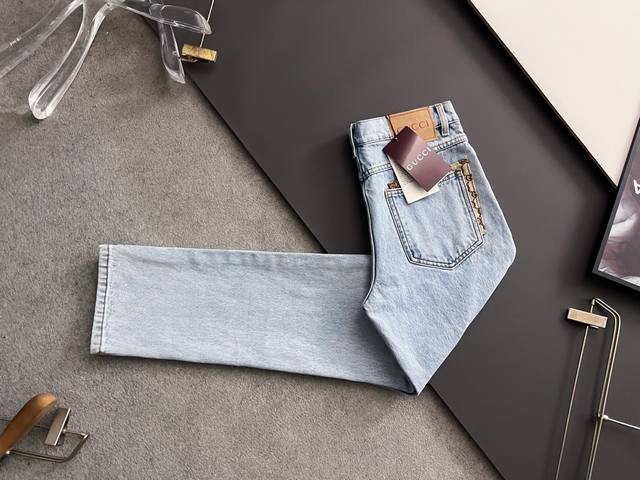 Gucc 25Ss new Gg-embellished washed jeans. These jeans combine denim with subtle