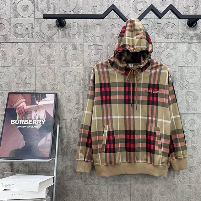 Burberry check logo with small embroidery. A refined upgrade, inspired by 1980s