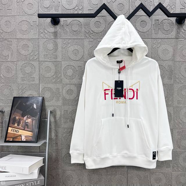 Fendi's minimalist logo with devil's eye embroidery. A refined upgrade, inspired