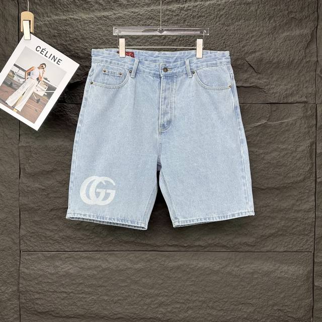 Gucci's new 2025 laser-printed logo denim couple's washed loose denim shorts .