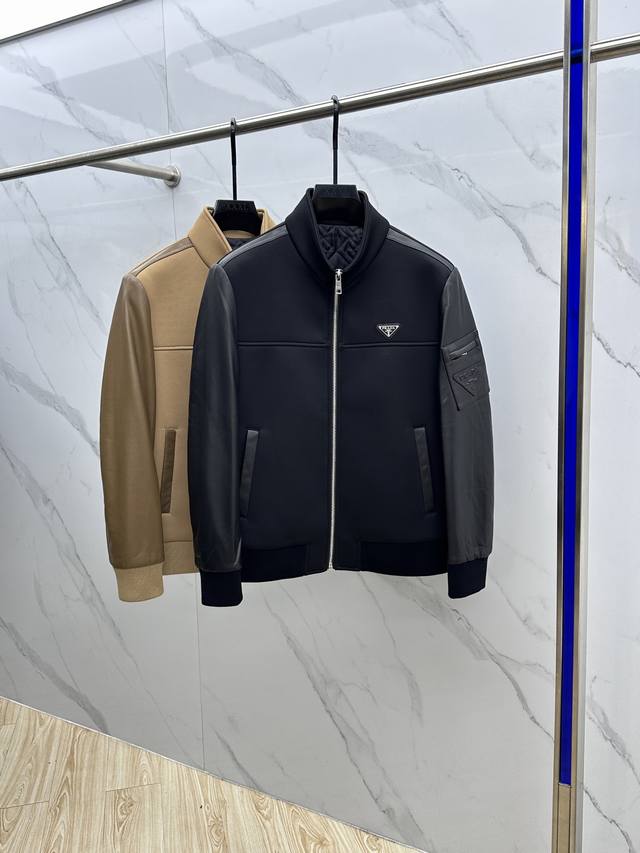 prada, 2025p. This stylish, stand-up collared jacket is an eye-catching piece wi