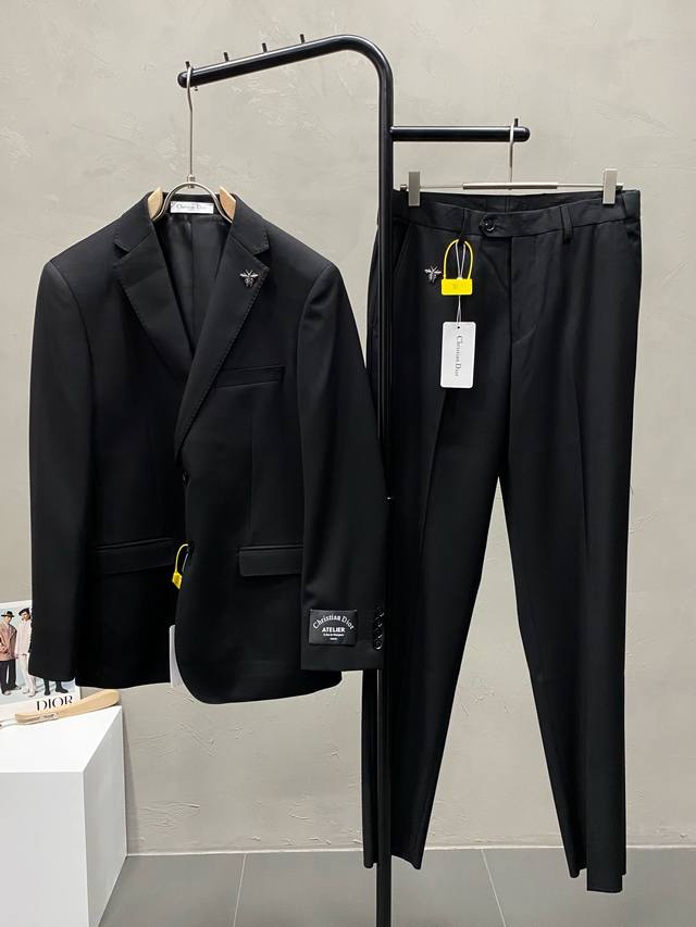 suit. Single-breasted jacket and trousers. Dior's new spring/autumn suit, a sim